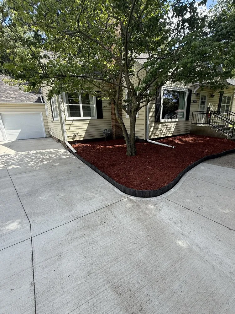 Professional outdoor landscaping with custom design in Fort Dodge, IA by Bacon Lawn Service