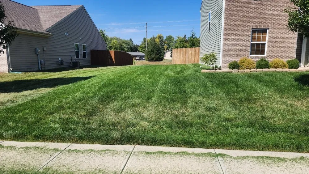 Custom garden landscaping for outdoor upgrades in Indianapolis, IN by Bad Boyz Lawn Maintenance