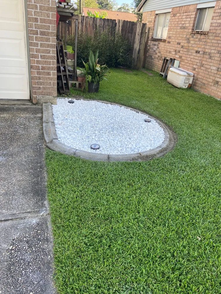 Custom landscape installation in Slidell, LA by Bad Dog Lawn Care