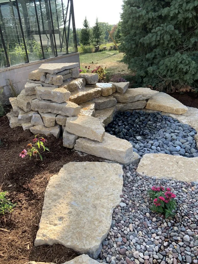 Custom outdoor landscaping in Belleville, WI by BadgerScape Design & Landscape