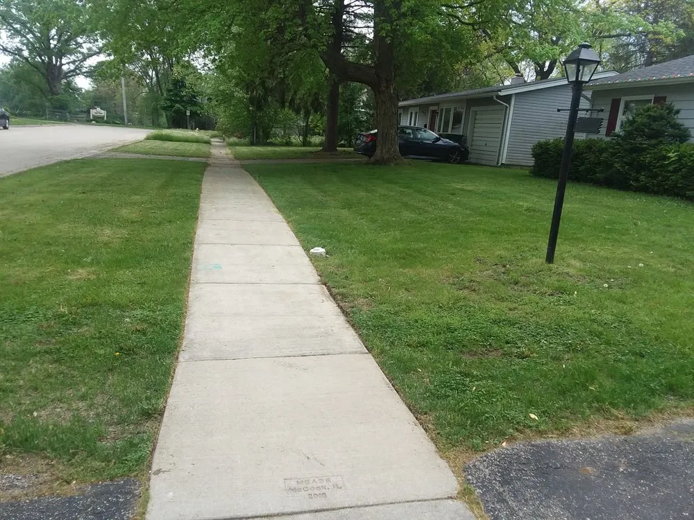 Affordable lawn mowing service for year-round maintenance in Gurnee, IL by Bailey's Landscape Maintenance