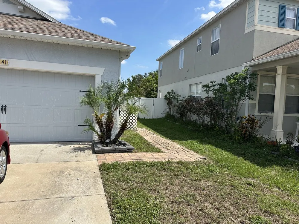 Reliable lawn care service in Poinciana, FL by Baker and Baker Enterprise