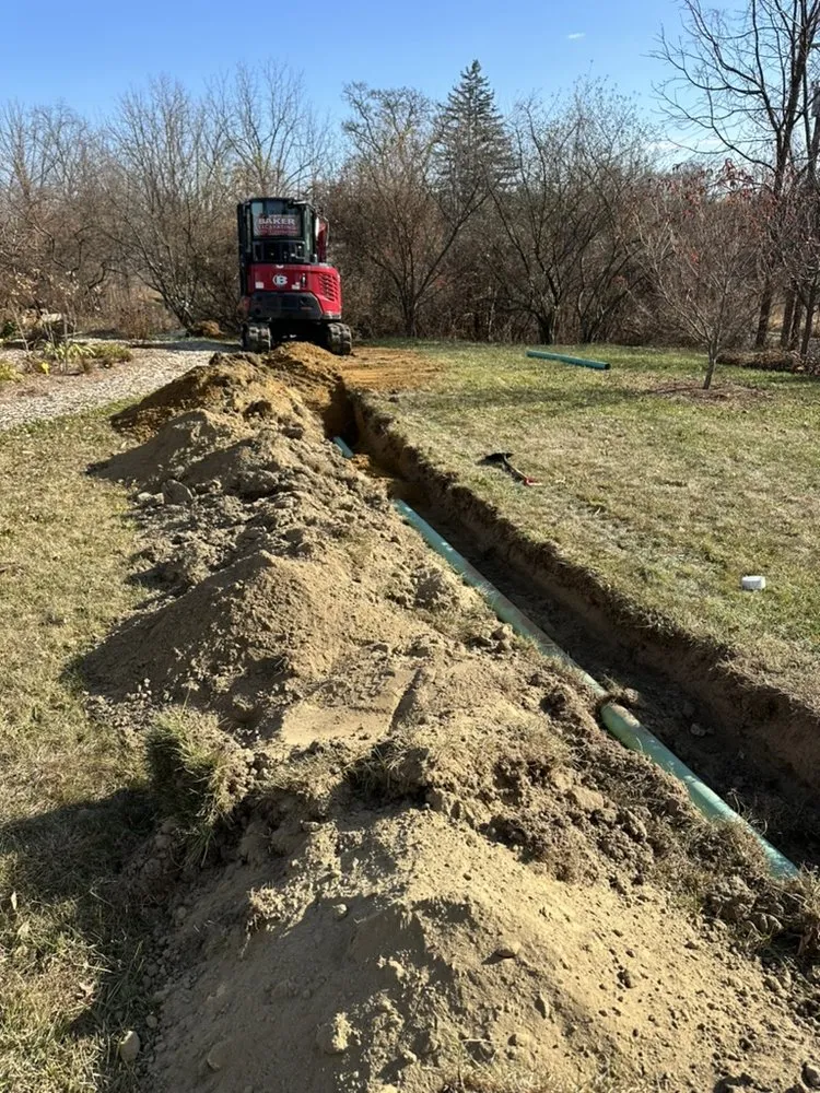 Expert yard cleanup service for year-round maintenance across Northampton, MA - Baker Excavating and Construction