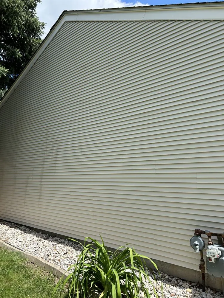 Expert garden landscaping for residential properties in Machesney Park, IL by Baker Family Xteriors