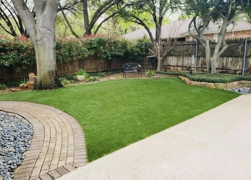 Affordable yard cleanup service for homes in Grandview, TX by Baker Landscaping