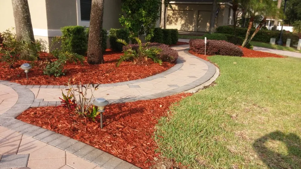 Top-rated lawn mowing service with custom design in Lakeland, FL by Baker's Outside Services and Solutions