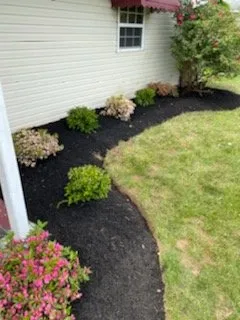 Professional lawn mowing service with custom design in Levittown, PA by Bakers Property Maintenance