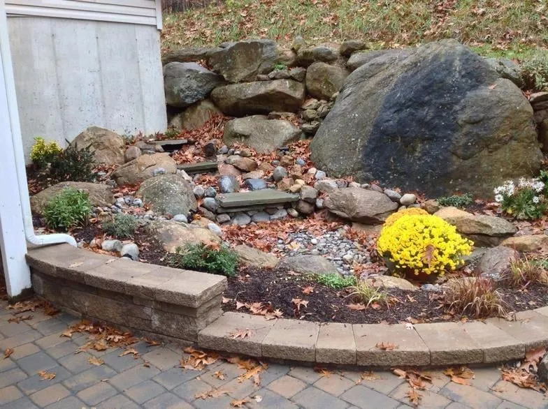 Custom landscape installation for homes in Green Brook, NJ by Balaney Contracting