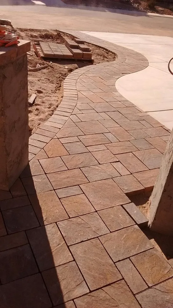 Reliable lawn mowing service for year-round maintenance in Tucson, AZ by BAM Landscaping and Masonry