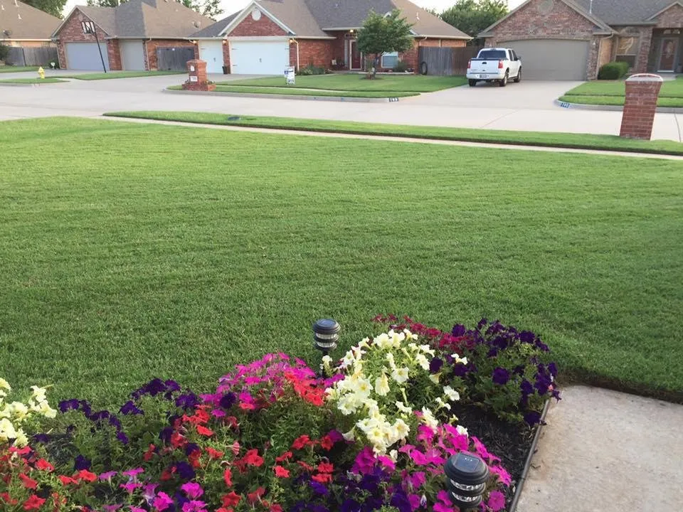 Professional yard maintenance in Yukon, OK by Bare Foot Turf
