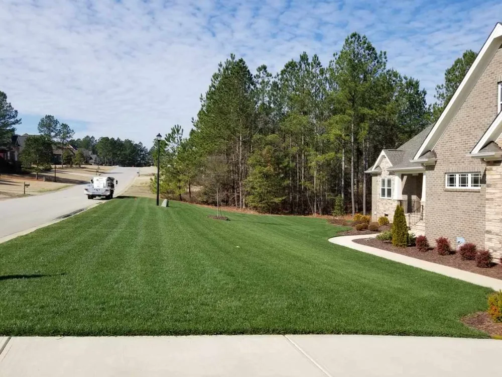 Affordable landscape installation with custom design in Smithfield, NC by Barefoot Lawn Care