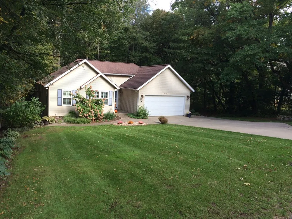 Custom lawn care service for homes across Kalamazoo, MI - Barefoot Lawn