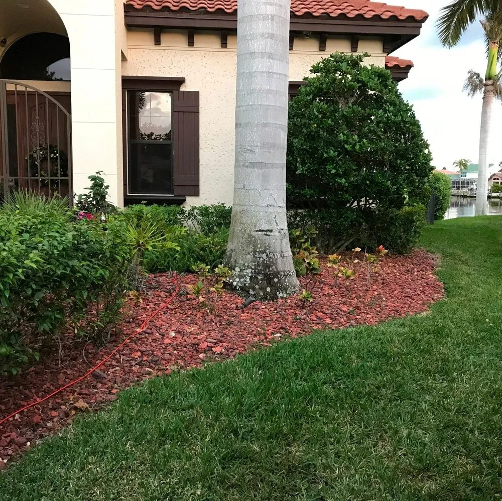 Custom garden landscaping for year-round maintenance in Fort Myers, FL by Barefoot Maintenance Specialists