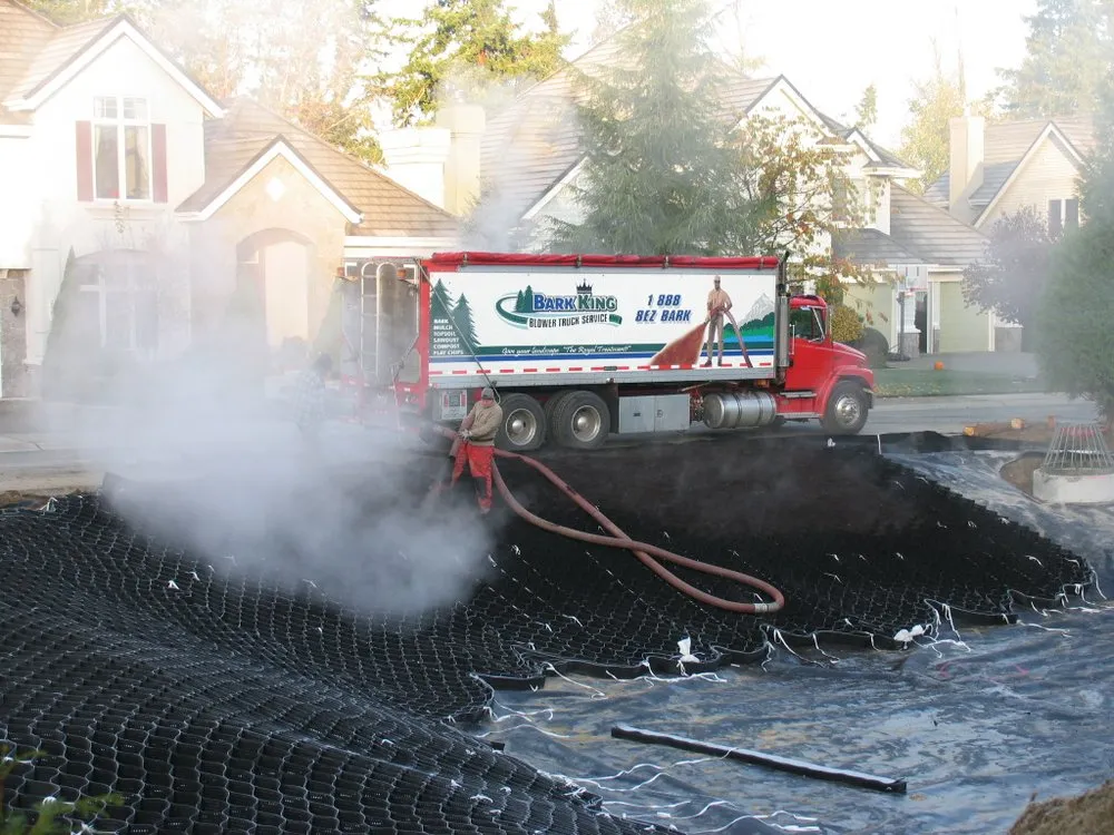 Top-rated residential landscaping with custom design in Woodinville, WA by Bark King Blower Truck Service