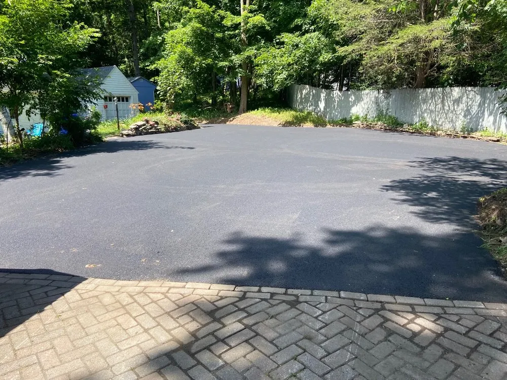 Affordable lawn care service for outdoor upgrades in Greenfield, MA by Barlow Tree Landscaping Excavation & Paving