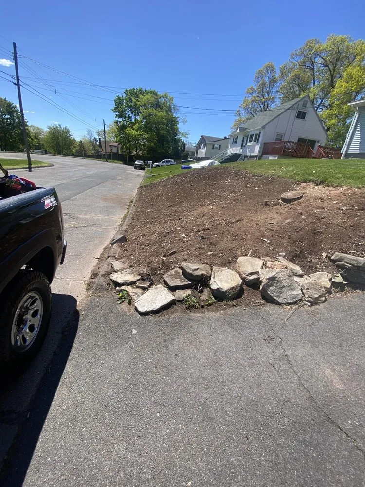 Reliable yard cleanup service for year-round maintenance in West Simsbury, CT by Barreto Landscaping