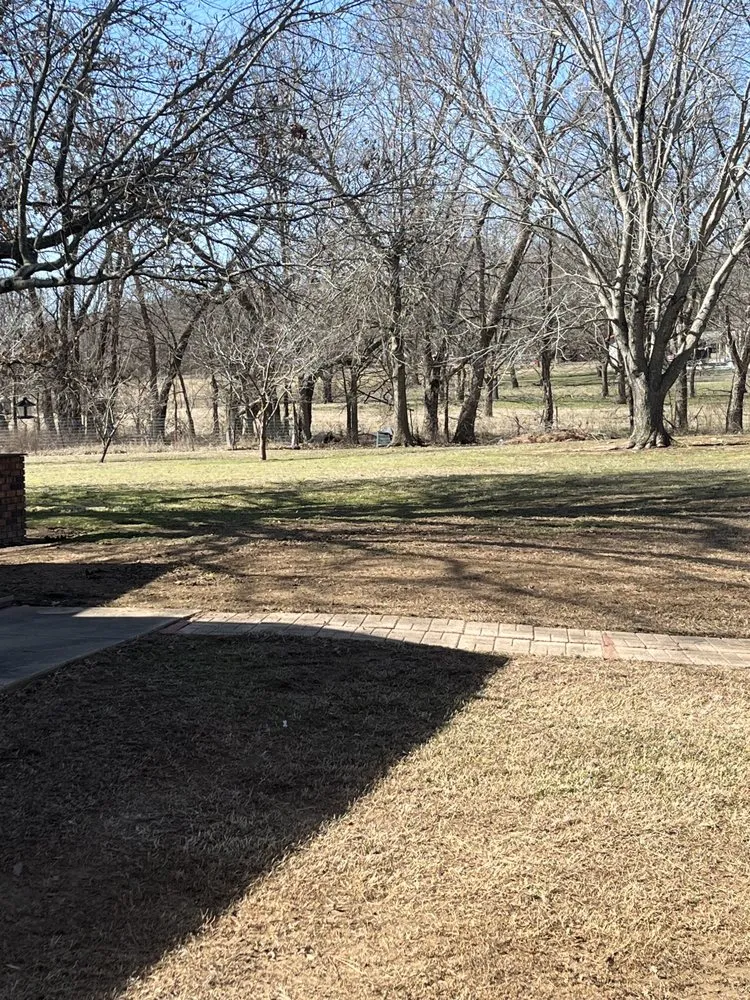 Custom garden landscaping with custom design in Locust Grove, OK by Barrett’s Lawn Care