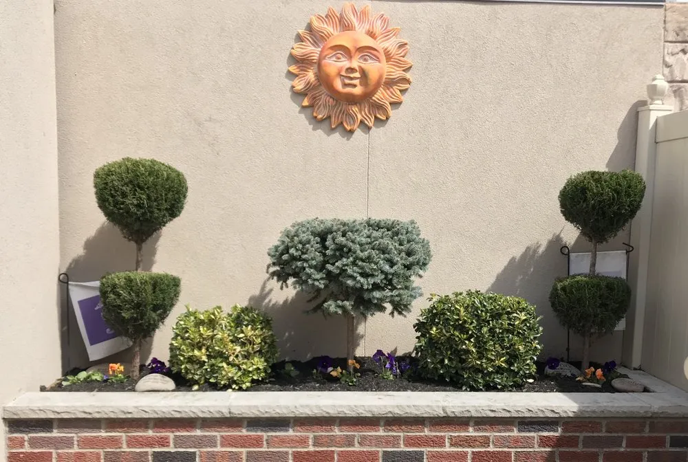 Top-rated lawn care service with custom design in Brooklyn, NY by Barricella Bro's Landscaping & Tree Removal