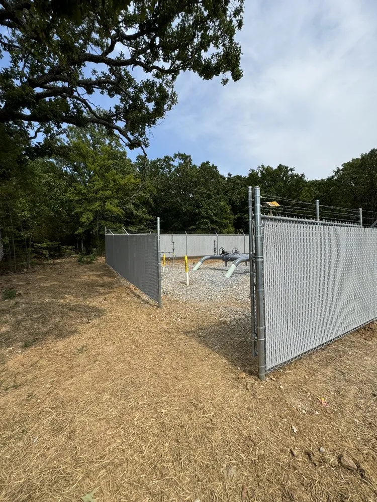 Professional yard cleanup service for residential properties across Fayetteville, AR - Barrier Solutions