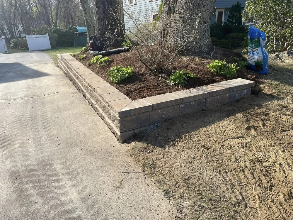 Custom landscape installation near you in Holliston, MA by Barrios Landscaping