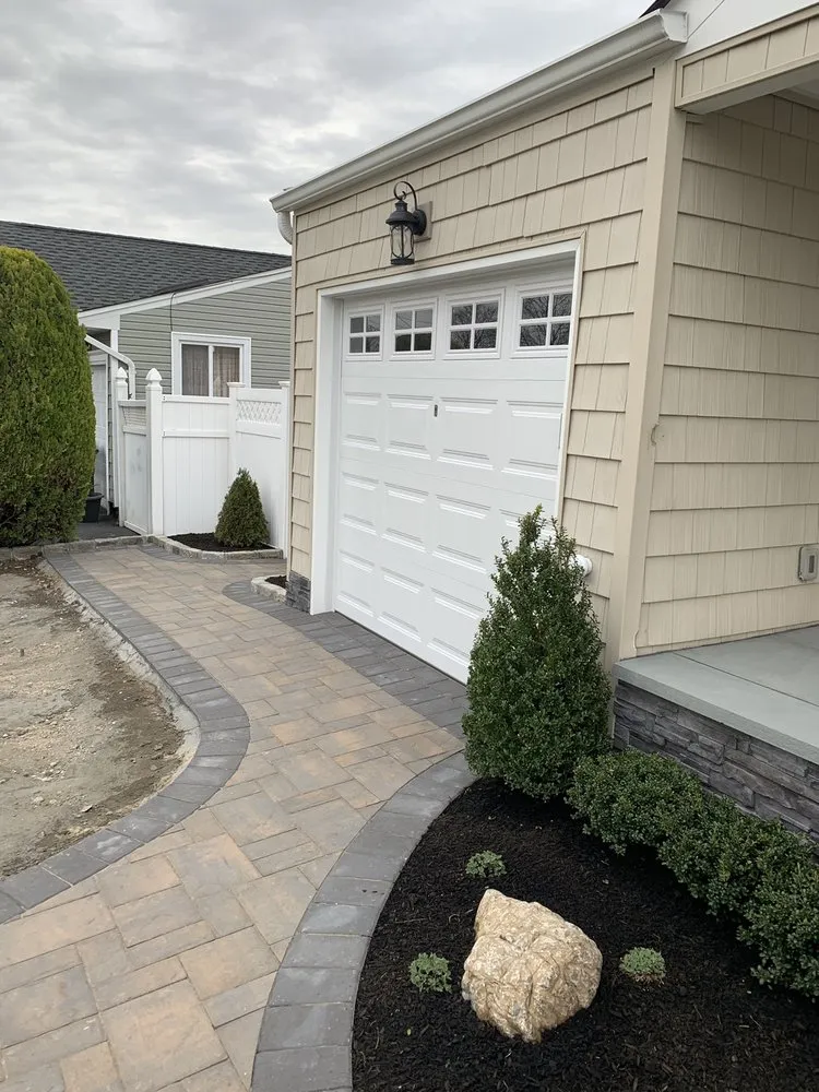 Affordable yard cleanup service with custom design across Deer Park, NY - Basics Landscaping