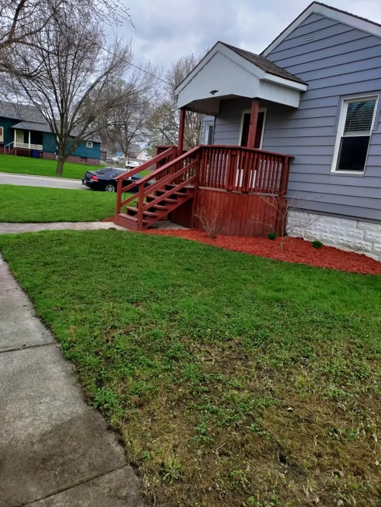 Expert lawn mowing service for residential properties in Bay City, MI by Bastian's lawncare and landscaping