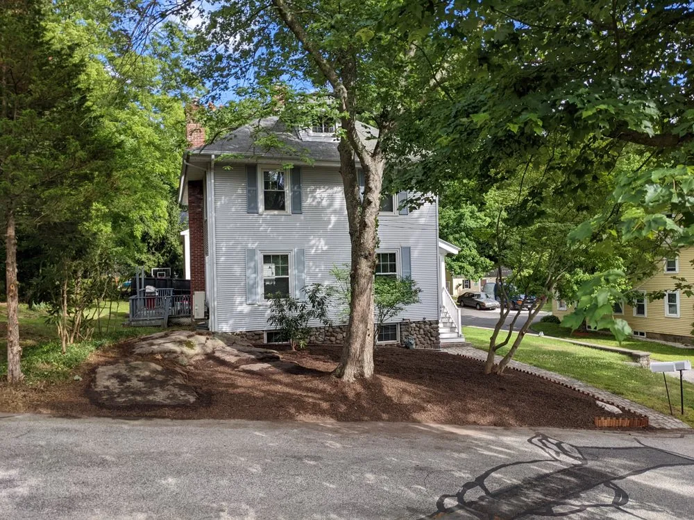 Professional yard cleanup service for residential properties across Bellingham, MA - Bastiao Landscaping & Snowplowing