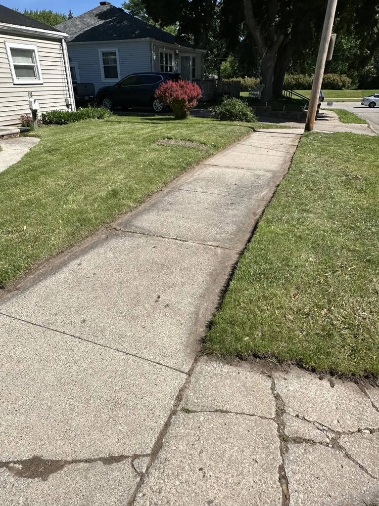 Custom lawn mowing service for beautiful yards across Green Bay, WI - Batal Lawn Care