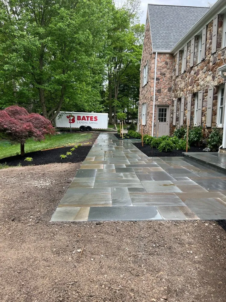 Local yard cleanup service with custom design in West Chester, PA by Bates Landscaping