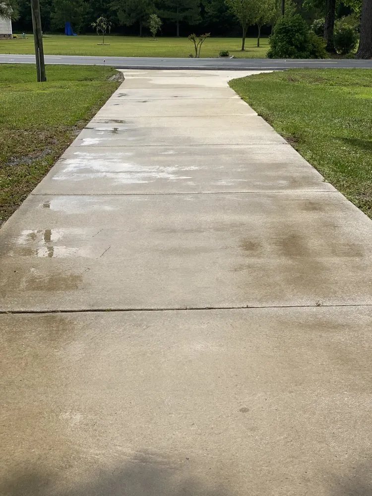 Local yard cleanup service for residential properties in Beulaville, NC by Batts' Lawn and Home Maintenance