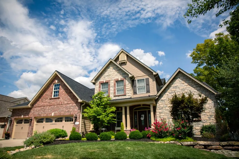 Professional lawn mowing service experts serving Ofallon, MO - Baxter Gardens West