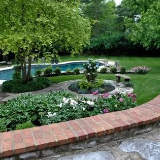 Expert yard cleanup service with custom design in Ofallon, MO by Baxter Gardens West