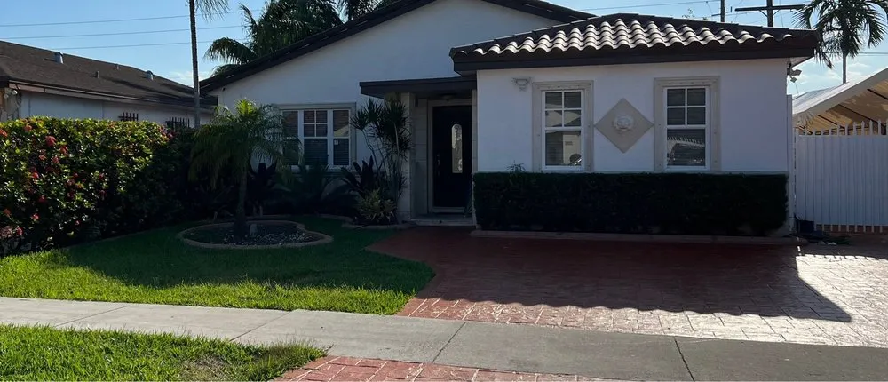 Professional lawn care service with custom design across Miami, FL - Bayamito & Sons Tree Trimming & Stump Removal