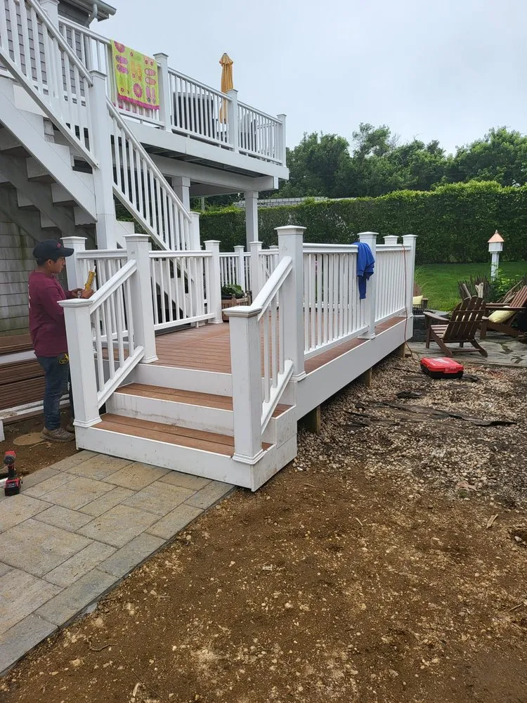 Affordable lawn mowing service with custom design across East Hampton, NY - B&C Carpentry & Landscaping