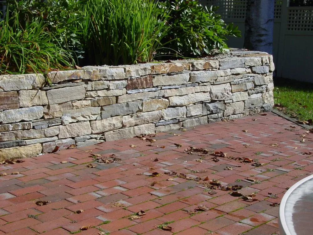 Professional yard maintenance for residential properties in Newbury, MA by BC Landscaping