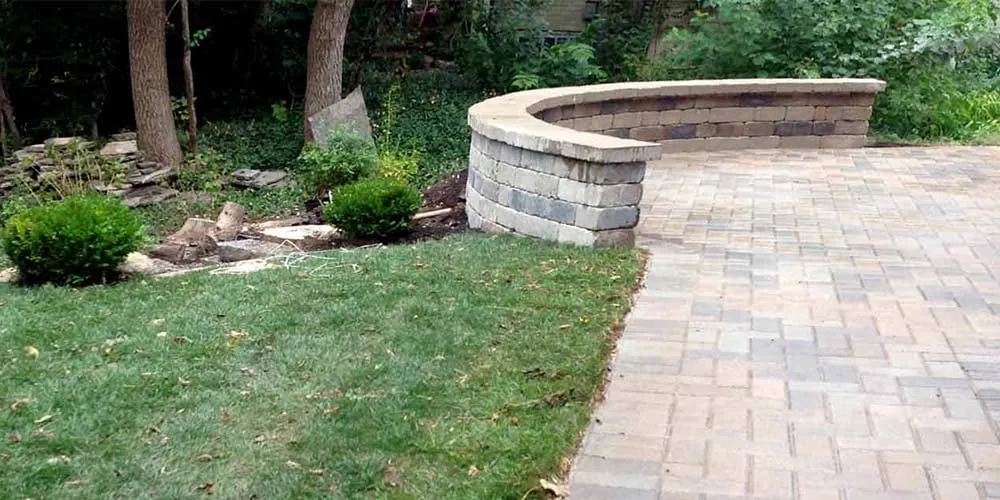 Professional yard maintenance for year-round maintenance across Woodstock, IL - B&C Pavers and Landscaping