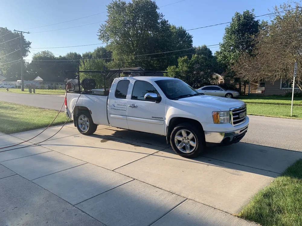 Professional lawn mowing service in Chesaning, MI - B.C.Details