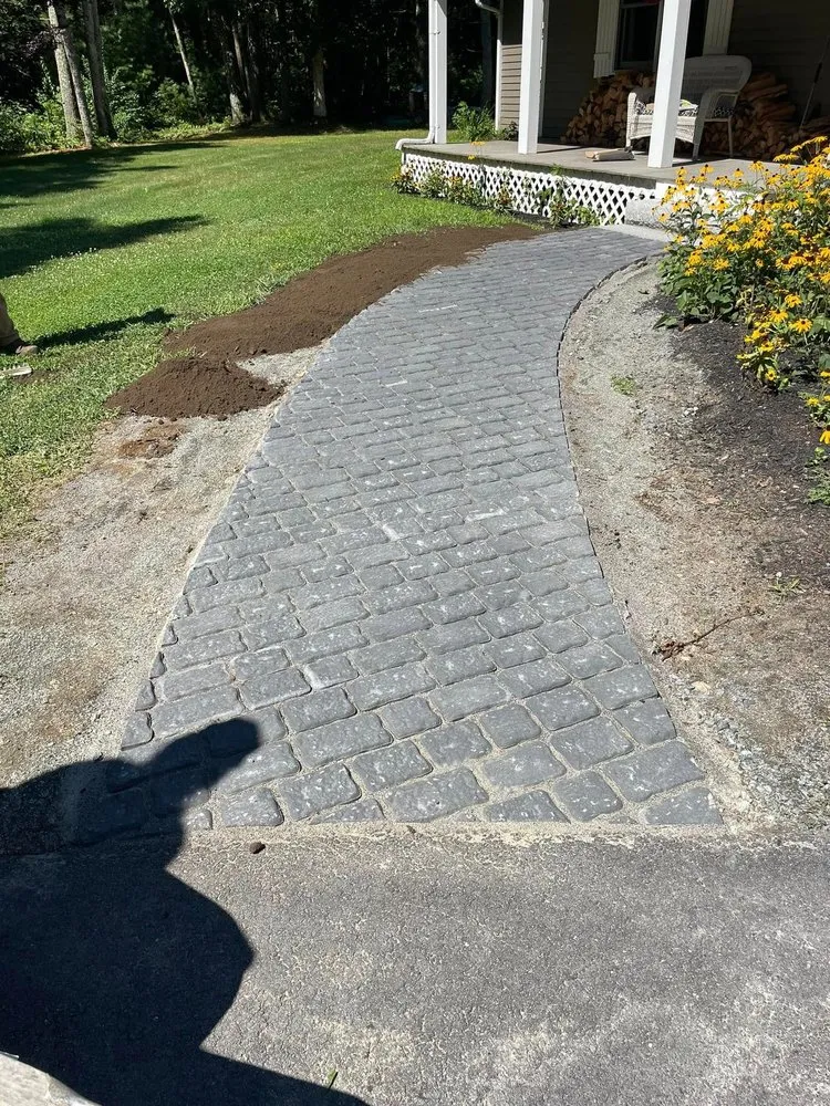 Professional lawn mowing service for residential properties in Carver, MA by B.C.S Landscape