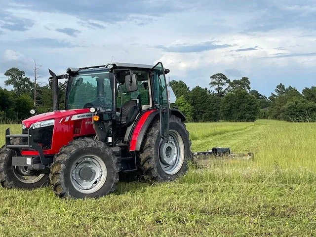 Trusted lawn mowing service for homes in Magnolia, TX by BDR Trucking & Tractor