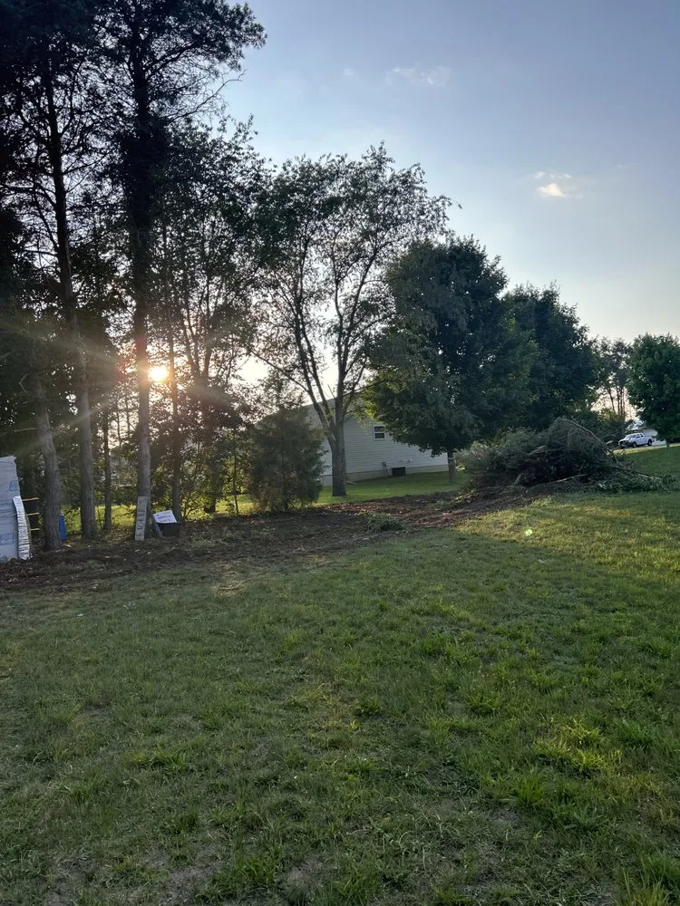 Custom landscape installation with custom design in Lawton, MI by B&E Excavating