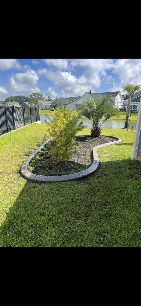 Custom yard cleanup service for beautiful yards in Longs, SC by Beach Borders Curbing