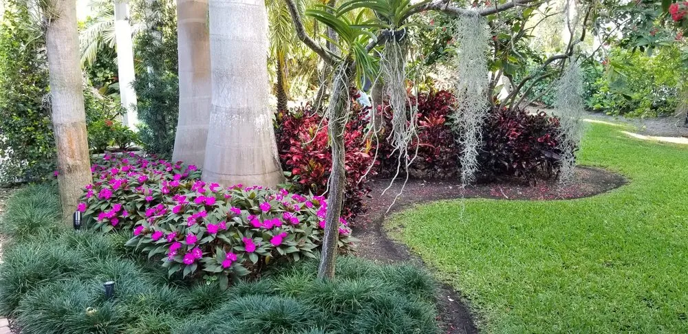 Custom landscape design with custom design in Miami, FL by Beach House Lighting and Landscaping