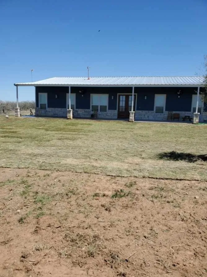 Custom yard maintenance for homes in Stockdale, TX by Bear Landscaping