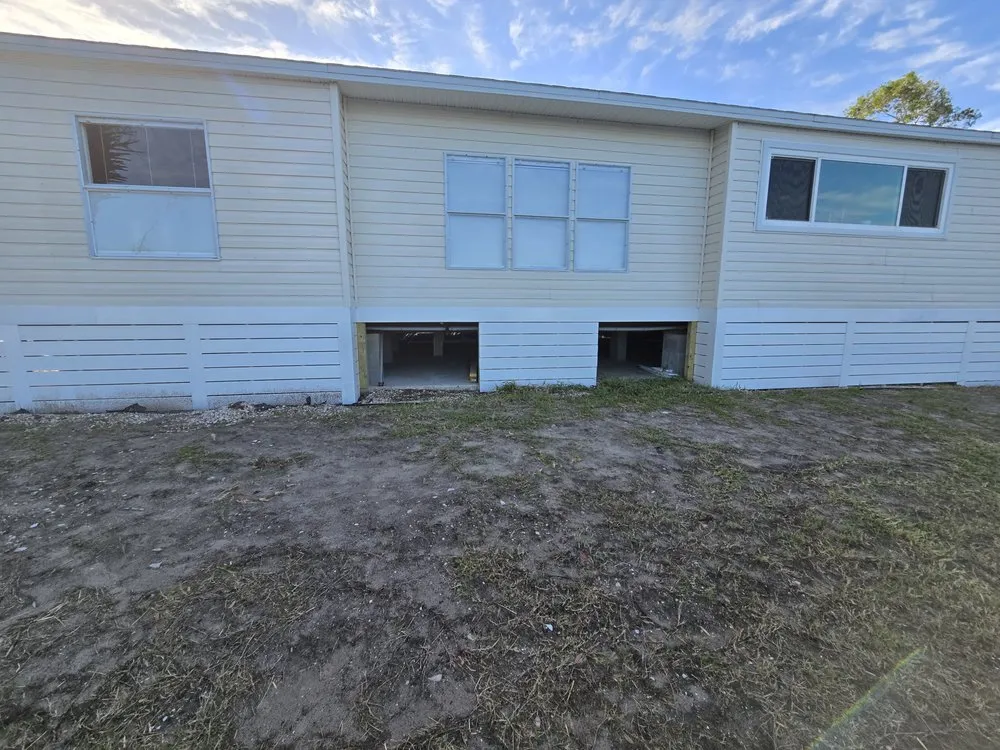 Affordable landscape design with custom design in Cocoa, FL by Bearded Bandito’s All Exterior Services