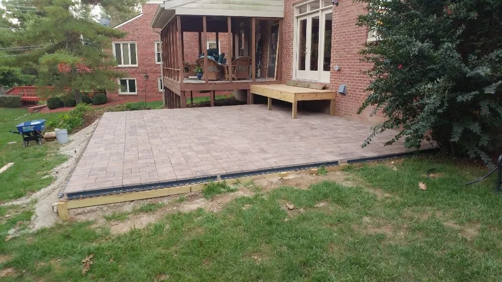 Custom outdoor landscaping for year-round maintenance in Lexington, KY by Bearin' Loads Hauling