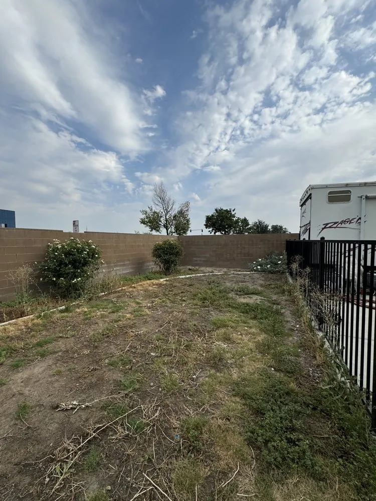 Expert lawn mowing service for year-round maintenance in Bakersfield, CA by Beat Feet General Cleanup