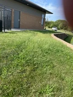 Custom yard maintenance for residential properties in Des Moines, IA by Beautiful Lawns