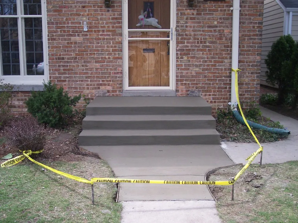 Custom landscape design for year-round maintenance in West Allis, WI by Becchetti Concrete Masonry