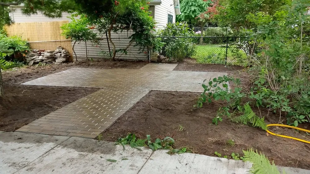 Expert yard cleanup service for beautiful yards in West Allis, WI by Becchetti Concrete Masonry