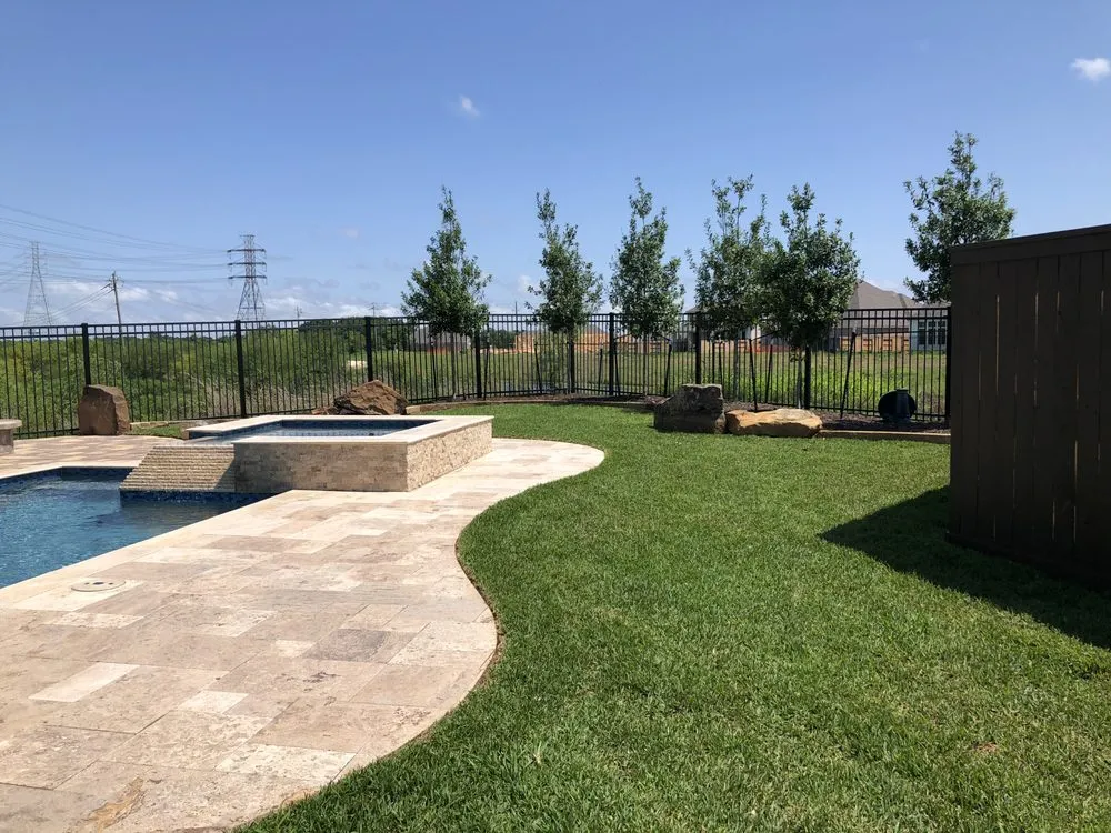 Custom landscape installation with custom design in Dickinson, TX by Beck Landscaping
